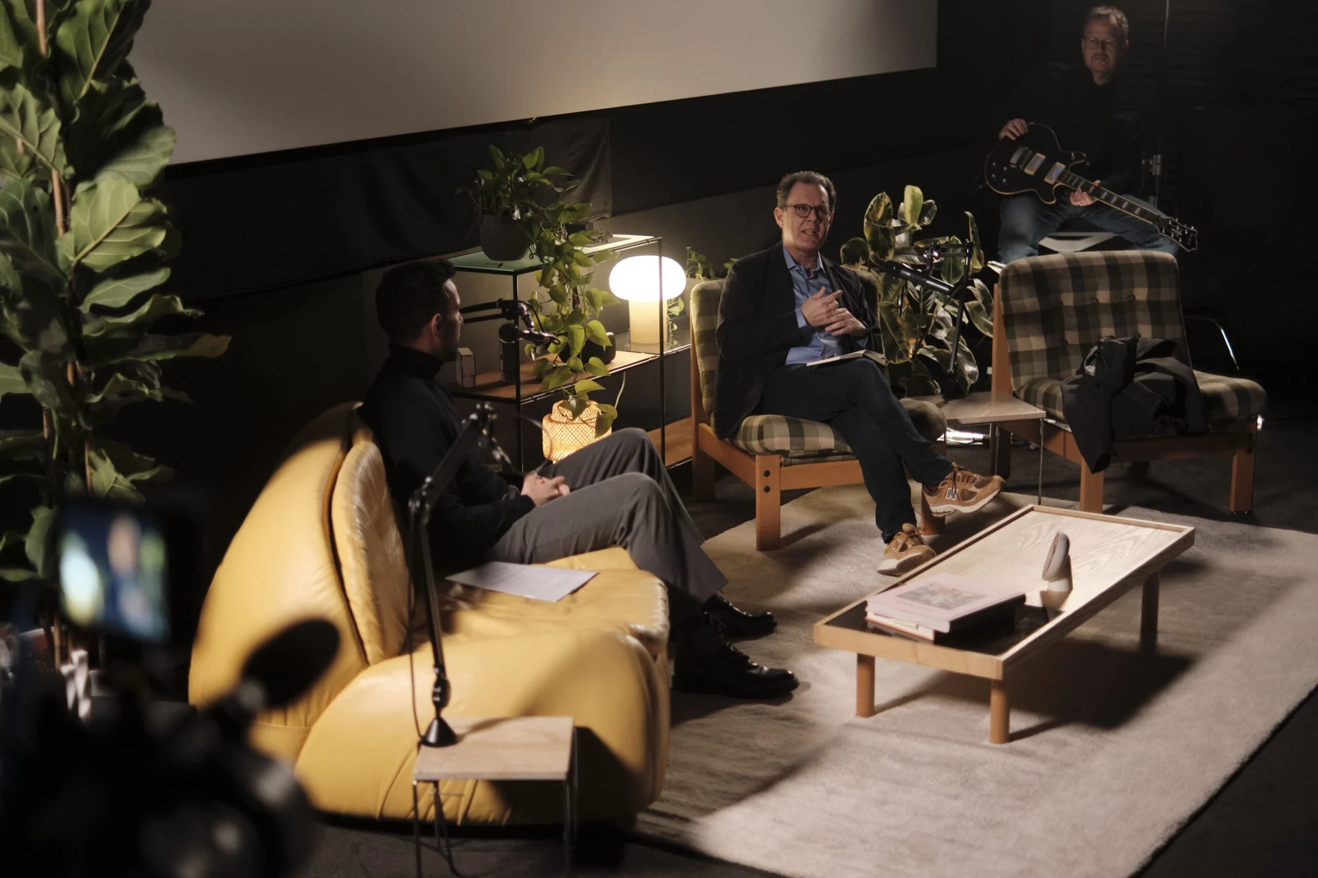 The living-room set at Cinematek, with guests mid-conversation