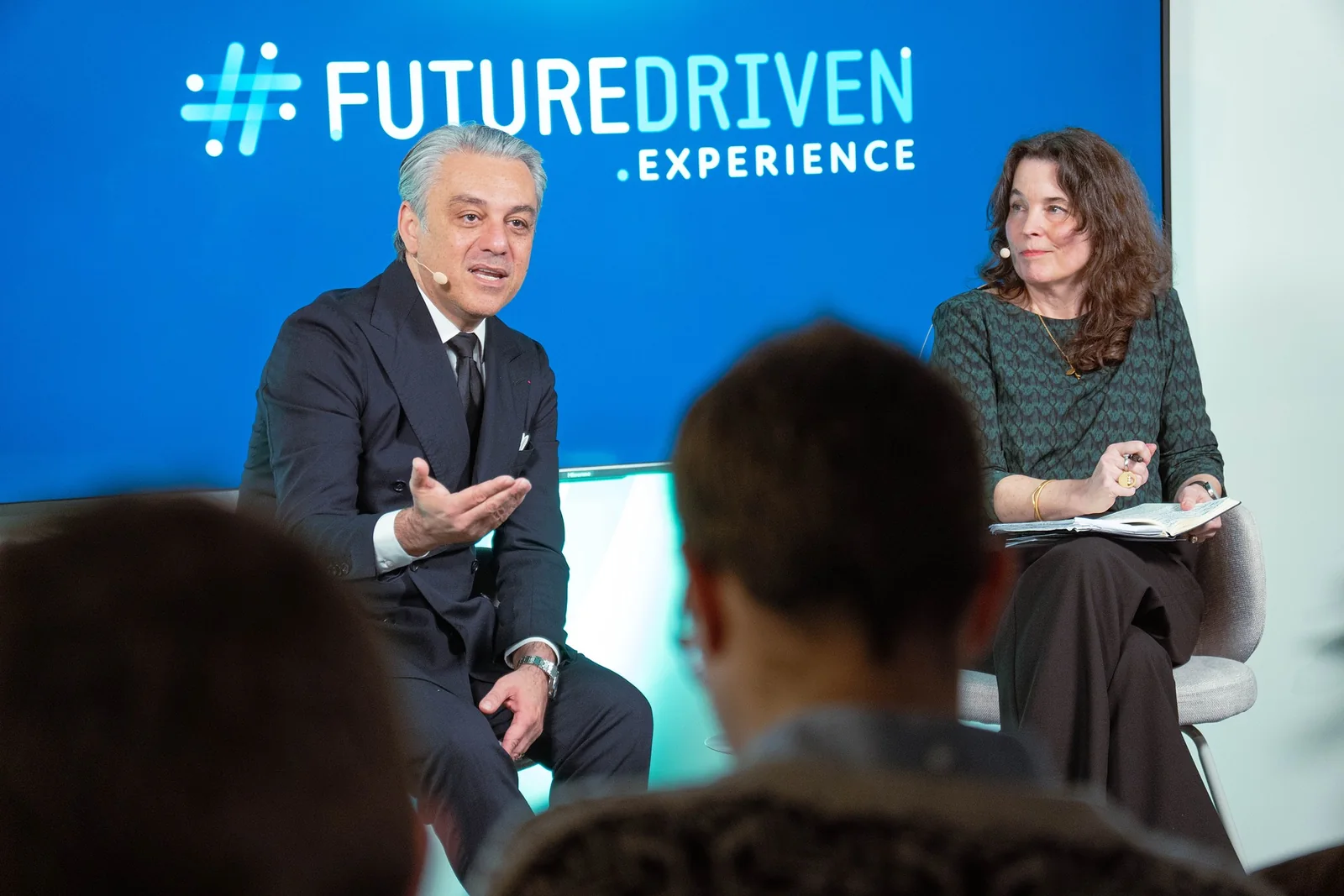 A speaker and host on the #FutureDriven Experience stage