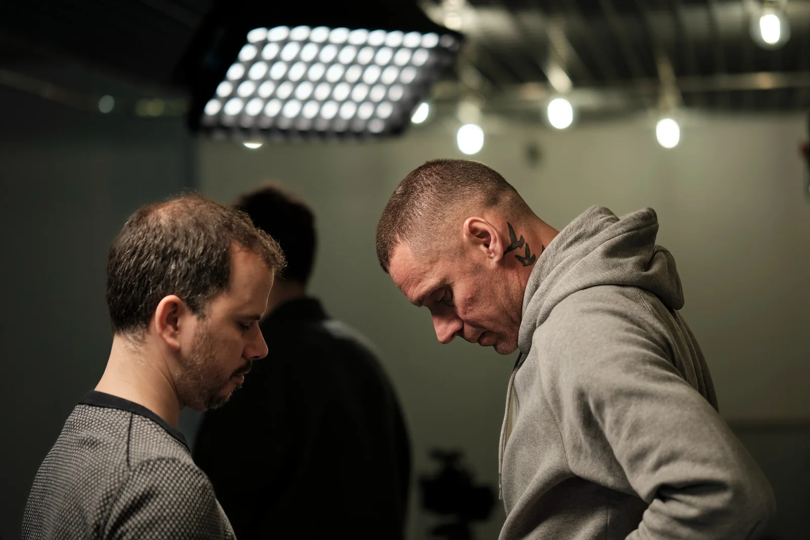 The crew setting up under the studio lights